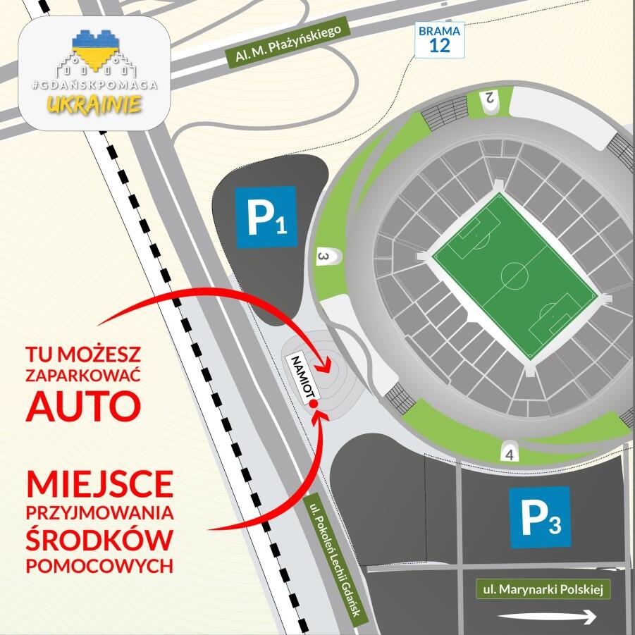 Mapka przedstawia obrys stadionu i drogi wokół niego. Jedną czerwoną strzałką zaznaczono trasę dojazdu i miejsce parkowania, drugą - też czerwoną - punkt przyjmowania darów 