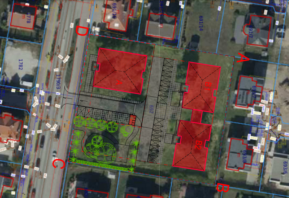 To koncepcja zabudowy miejskiej działki przy ul. Jednorożca. to mapa z naniesionymi grafikami - obrysami budynków