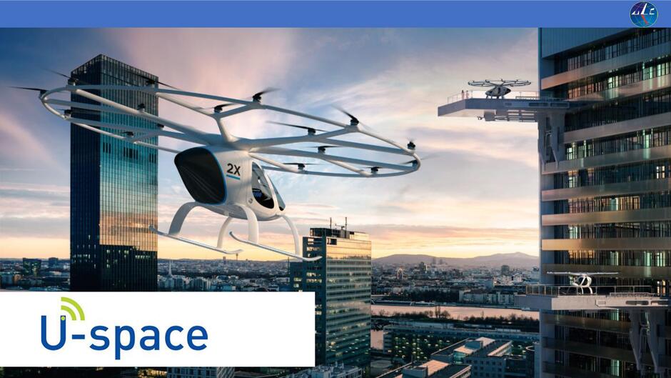 Plansza z dronem na tle wysokiego budynku