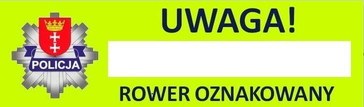 Na obrazku widnieje znak ostrzegawczy z napisem UWAGA! ROWER OZNAKOWANY  na jaskrawozielonym tle. Po lewej stronie znajduje się logo polskiej policji z godłem miasta Gdańsk.