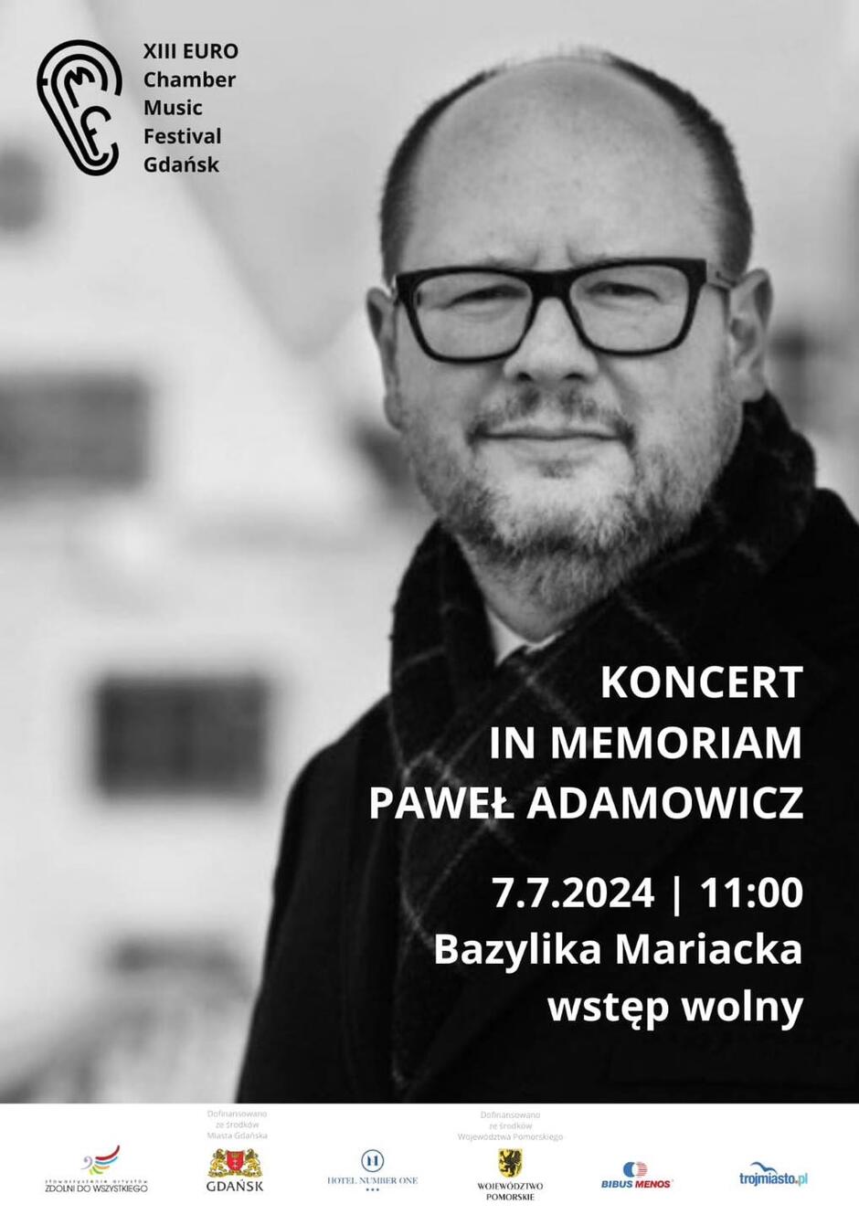 Plakat z wizerunkiem prezydenta Adamowicza i informacjami o koncercie