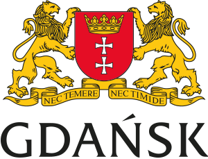 Herb przedstawia tarczę i dwa podtrzymujące ją złote lwy zwrócone do siebie, u podstawy tarczy złota wstęga z czarno kreśloną dewizą NEC TEMERE NEC TIMIDE.