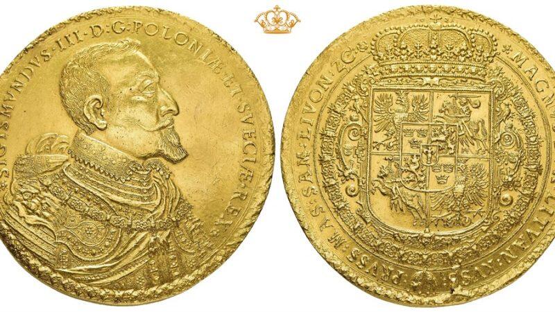 Rewers i awers dużej złotej monety z profilem króla z jednej strony i herbem królewskim z drugiej