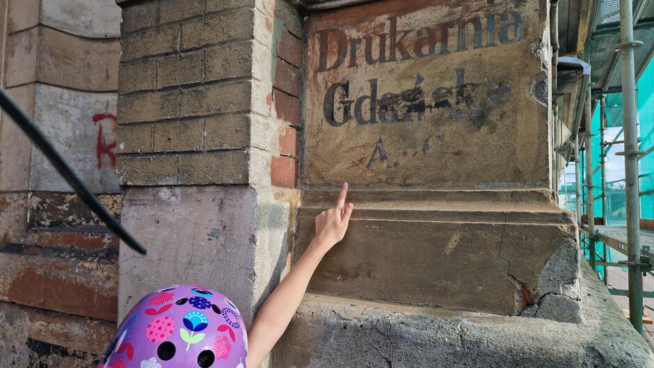Napis na murze Drukarnia Gdańska A.G.