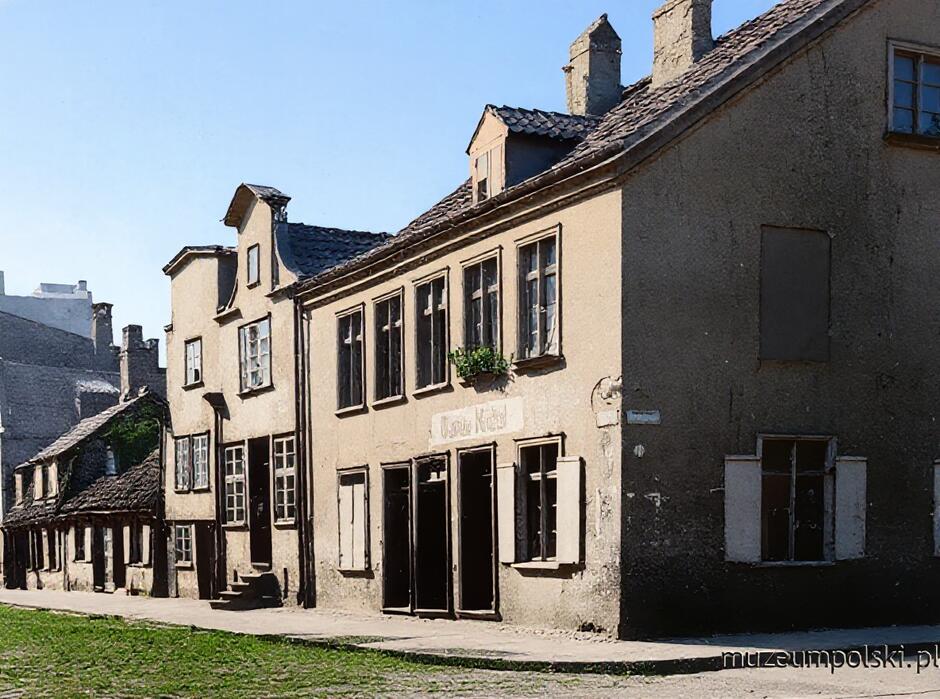 Koloryzowana fotografia pokazująca stare małe domki przy ulicy