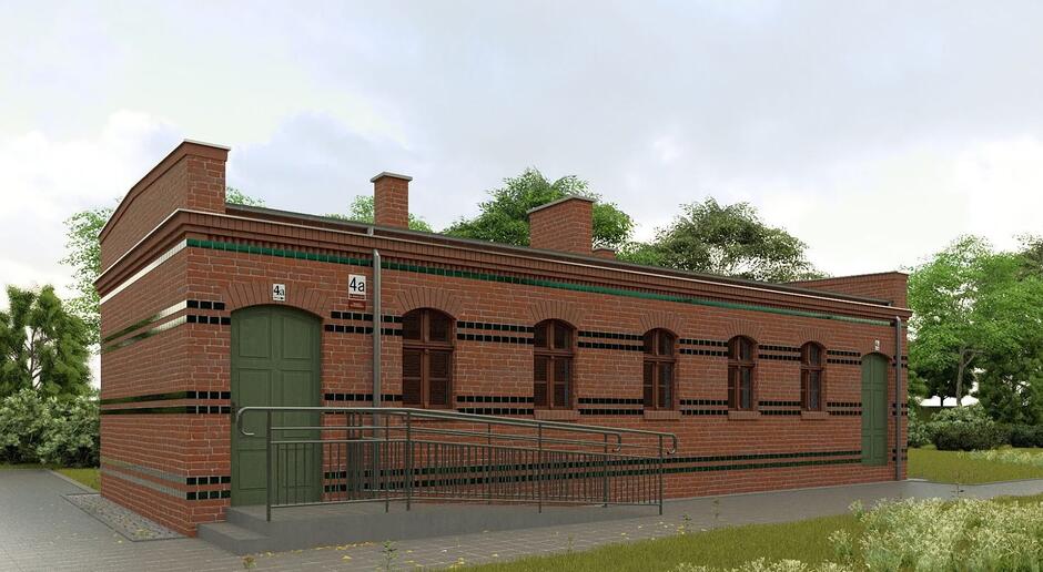 Parterowy budynek z cegły z podjazdem dla niepełnosprawnych