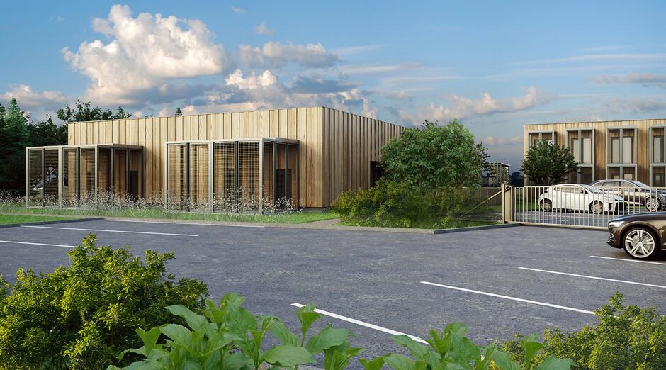 wizualizacja przedstawia niski nowoczesny budynek