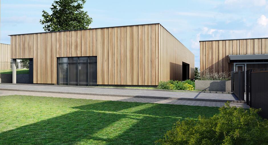 wizualizacja przedstawia niski nowoczesny budynek