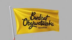 żółta flaga z napisem: budżet obywatelski