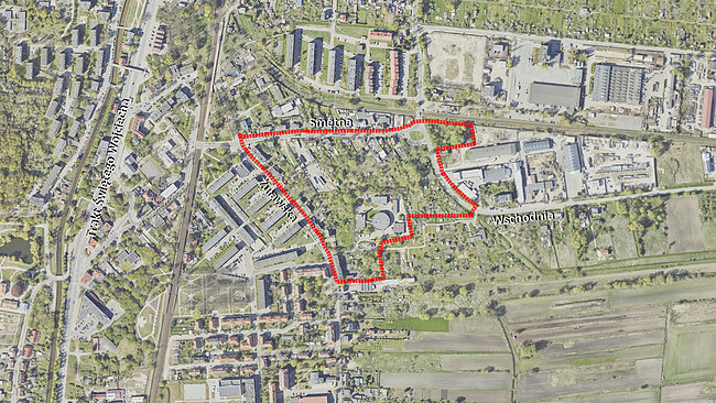 Mapa z fragmentem miasta z zaznaczonymi na czerwono granicami projektu miejskiego zmian przestrzennnych.