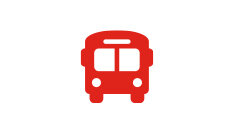 Czerwona ikonka autobusu na białym tle