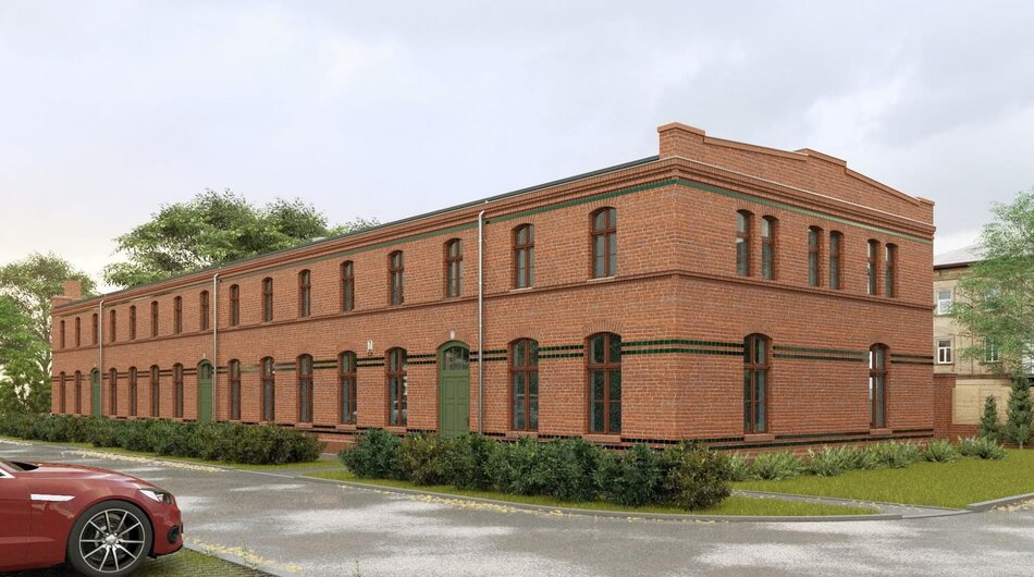 Piętrowy ceglany budynek